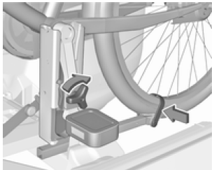 Fijar una bicicleta al portabicicletas trasero