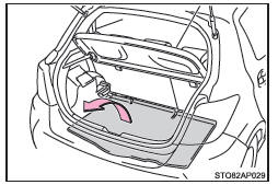 Extracción del kit de emergencia para la reparación de pinchazos